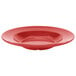 A red bowl with a white background.