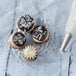 Chocolate and coconut cookies with icing piped using an Ateco pastry tip.