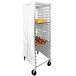 A white vinyl Curtron bun pan rack cover on a shelf with bread and rolls.