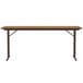 A Correll rectangular medium oak folding seminar table with off-set legs.