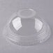 A clear plastic dome lid with a hole.