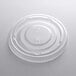 A clear plastic Fabri-Kal lid on a white surface.