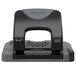 A close-up of a black and gray Swingline 2 hole punch.