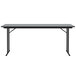 A rectangular gray granite Correll seminar table with black legs.