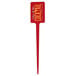 A red WNA Comet rectangular pick with the word "chicken" on it.