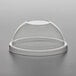 A clear plastic dome lid on a clear plastic cup.