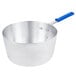 A silver sauce pan with a blue handle.