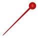 A red plastic stick with a red circle on the end.