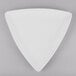 A close up of a white Libbey Porcelana triangle shaped plate.