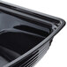 a black plastic tray with a white background