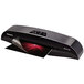 A black and silver Fellowes Callisto 125 laminator with a red light.