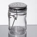 A Tablecraft glass jar with a stainless steel clip-top lid.