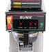 A Bunn CWTF15-3 commercial automatic coffee machine on a counter.
