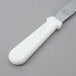 a white knife with a white handle