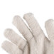 A pair of white Cordova terry baker gloves.