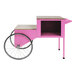 A pink Benchmark USA cotton candy cart with a wooden shelf.