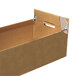 A brown Bankers Box storage drawer with a handle.