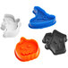 A Ateco 4-piece plastic Halloween cookie cutter set.