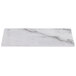 A white rectangular Thunder Group faux marble serving board with a gray stripe.