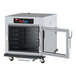 A Metro C5 undercounter heated holding and proofing cabinet with a clear door holding a tray.