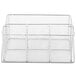 A Clipper Mill chrome plated iron flatware caddy with four wire mesh compartments.