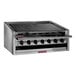 A MagiKitch'n stainless steel low profile charbroiler with four burners.