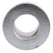 A metal Cooking Performance Group door shaft bushing.
