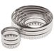 A set of six Ateco stainless steel two-sided round cookie cutters.