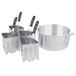 A Vollrath Wear-Ever aluminum pasta cooker set with four silver inserts.