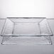 A clear square glass Libbey tempo plate on a white surface.