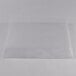 A clear plastic bag on a white surface with a Clipper Mill by GET clear plastic basket liner inside.