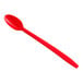 A red plastic soda/sundae spoon.