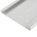 A white metal Vollrath wall mount bracket with holes in it.