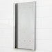 A stainless steel wall mount bracket with holes on a white tile wall.