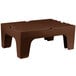 A brown plastic Cambro bow tie dunnage rack top.