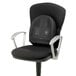 A black office chair with a Fellowes black backrest.