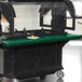 A green Cambro tray rail on a green and black Versa food cart.