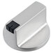 A silver stainless steel knob with black accents on a black and white button.
