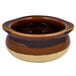 A brown and white Tuxton China onion soup crock with a handle.