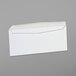 A close-up of a Universal white business envelope with a side seam.