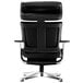 A Eurotech Nuvem black leather office chair with aluminum legs.