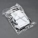 A plastic bag of WNA Comet Reflections Duet stainless steel look plastic forks with black handles.