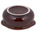 A Tuxton caramel ceramic French onion soup crock with a white rim.