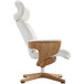 A white office chair with wooden legs and armrests.