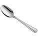 An Acopa stainless steel teaspoon with a silver handle on a white background.