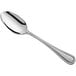 An Acopa Edgeworth stainless steel serving spoon with a silver handle.