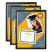 Three Universal black plastic frames holding certificates.