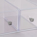 A clear acrylic Cal-Mil bread box with two drawers and silver knobs.