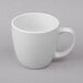 A Libbey bright white porcelain mug with a handle.