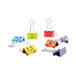 A group of Universal assorted emoji themed medium binder clips including blue, purple, and yellow clips with smiley faces.